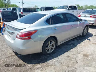 2013 Nissan Altima SV with VIN 1N4AL3AP4DN472936, listed as a IAAI auction lot 42053589 with 180,801 mi miles and . Bid and sale history available at carsss.com. Image 4.
