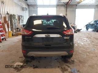 2016 Ford Escape Titanium with VIN 1FMCU0JX3GUB70607, listed as a IAAI auction lot 41727421 with 106,857 mi miles. Bid and sale history available at carsss.com. Image 17.