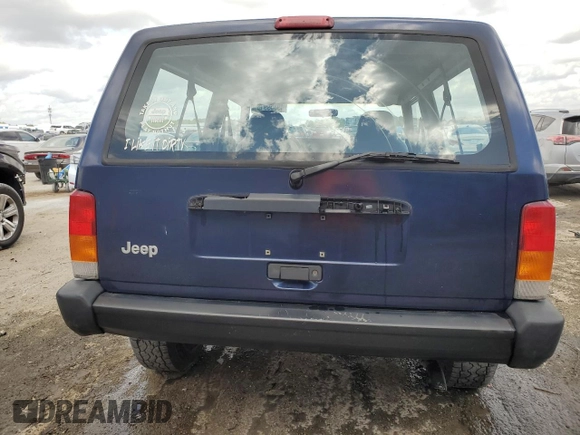 1997 Jeep Cherokee SE with VIN 1J4FT27P0VL612859, listed as a Copart auction lot 49869915 with 198,702 mi miles and Salvage title. Bid and sale history available at DreamBid. Image 6.