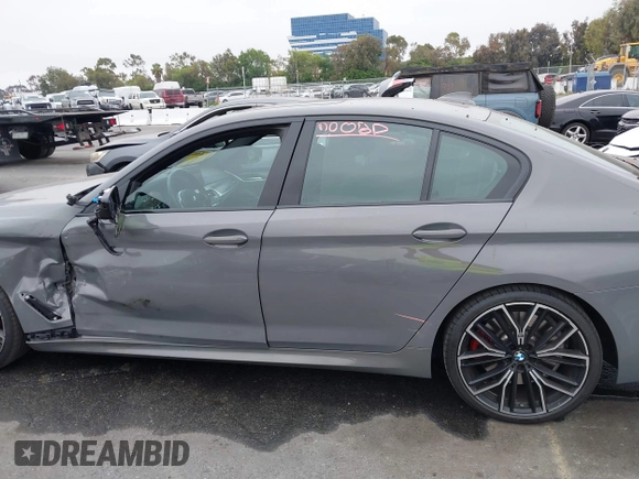 2022 BMW 5 Series M550i xDrive with VIN WBA13BK07NCL07995, listed as a IAAI auction lot 42454963 with 12,721 mi miles and . Bid and sale history available at DreamBid. Image 14.