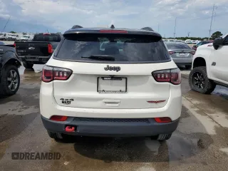 2019 Jeep Compass Trailhawk z VIN 3C4NJDDB5KT799401, wystawiony jako Copart lot #54770485 z przebiegiem 87 640 mil mil oraz Nie do naprawy • Non repairable. Historia ofert i sprzedaży dostępna na DreamBid. Obrazek 6.