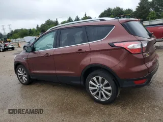 2018 Ford Escape Titanium z VIN 1FMCU0J93JUA70449, wystawiony jako Copart lot #59303245 z przebiegiem 165 907 mil mil oraz Szkoda całkowita • Salvage title. Historia ofert i sprzedaży dostępna na DreamBid. Obrazek 2.