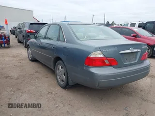 2004 Toyota Avalon XL with VIN 4T1BF28B84U370390, listed as a IAAI auction lot 41351151 with 242,910 mi miles and . Bid and sale history available at DreamBid. Image 3.