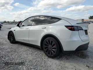 2024 Tesla Model Y Performance with VIN 7SAYGDEF3RF050704, listed as a Copart auction lot 45512455 with 15,539 mi miles and Salvage Title. Bid and sale history available at DreamBid. Image 2.