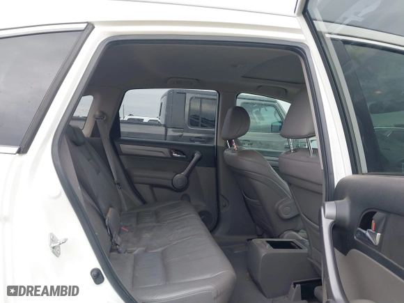 2009 Honda CR-V EX-L with VIN JHLRE38769C007979, listed as a IAAI auction lot 41582690 with 193,292 mi miles. Bid and sale history available at carsss.com. Image 8.