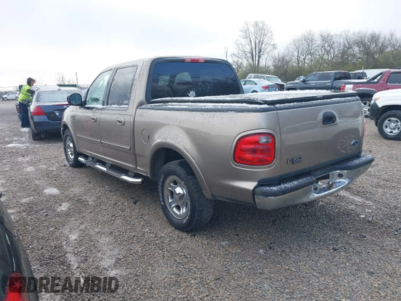 2003 Ford F-150 XLT with VIN 1FTRW07673KD34518, listed as a IAAI auction lot 41975405 with 95,775 mi miles. Bid and sale history available at carsss.com. Image 3.