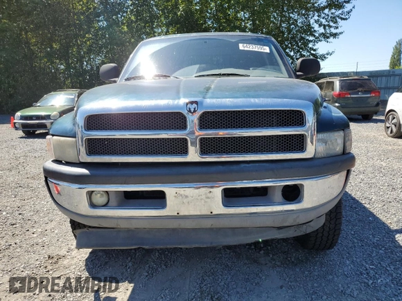 1999 Dodge 2500 with VIN 1B7KF23W2XJ539940, listed as a Copart auction lot 64237595 with 211,718 mi miles and Salvage title. Bid and sale history available at DreamBid. Image 5.