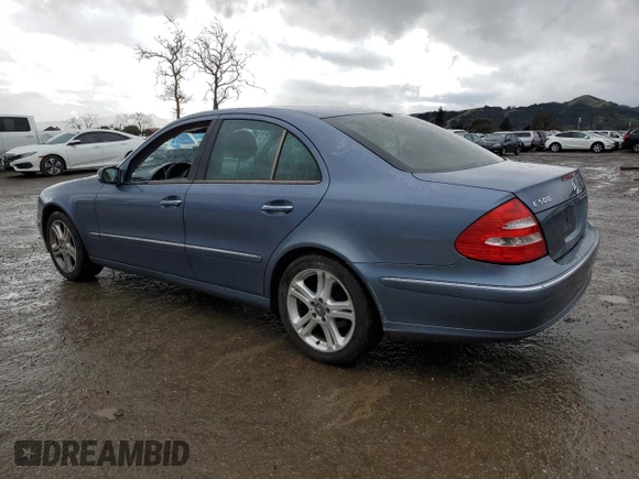 2004 Mercedes-Benz E-Class 5.0L with VIN WDBUF70J94A406133, listed as a Copart auction lot 44396845 with 123,999 mi miles and Salvage Title. Bid and sale history available at carsss.com. Image 2.