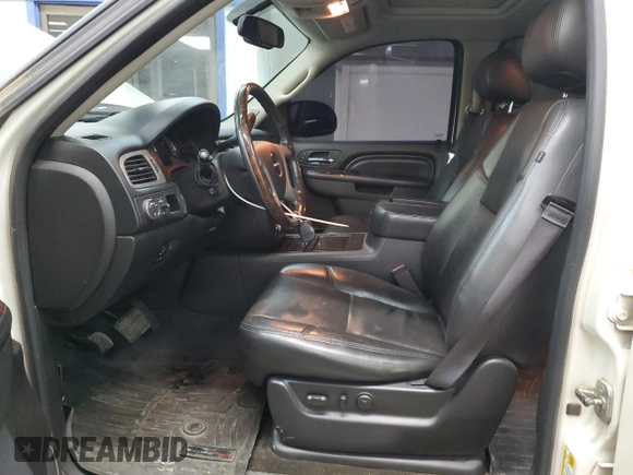 2014 GMC Yukon Denali with VIN 1GKS2EEF6ER141112, listed as a Copart auction lot 88526685 with 142,248 mi miles and Salvage Title. Bid and sale history available at carsss.com. Image 7.