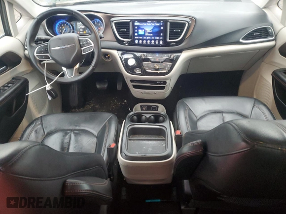 2017 Chrysler Pacifica Touring L with VIN 2C4RC1BG4HR810277, listed as a Copart auction lot 77885014 with 101,492 mi miles and Salvage Title. Bid and sale history available at DreamBid. Image 8.