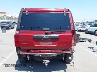 2007 Jeep Commander Sport z VIN 1J8HG48K97C530030, wystawiony jako IAAI lot #42471903 z przebiegiem 195 416 mil mil oraz . Historia ofert i sprzedaży dostępna na DreamBid. Obrazek 6.