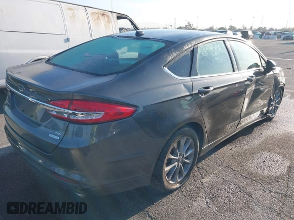 2017 Ford Fusion SE with VIN 3FA6P0HD4HR311462, listed as a IAAI auction lot 41824553 with 124,911 mi miles. Bid and sale history available at carsss.com. Image 4.