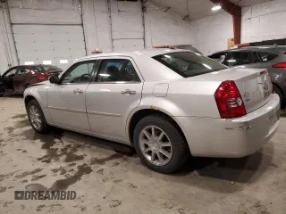 2010 Chrysler 300 Touring with VIN 2C3CK5CV4AH134524, listed as a Copart auction lot 52851795 with 152,789 mi miles and Salvage Title. Bid and sale history available at carsss.com. Image 2.