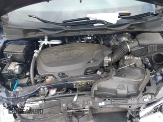 2022 Honda Odyssey EX-L with VIN 5FNRL6H70NB053843, listed as a IAAI auction lot 40210685 with 21,571 mi miles and . Bid and sale history available at DreamBid. Image 10.