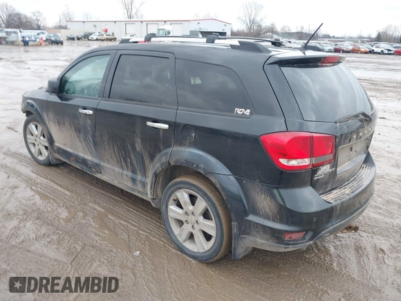 2013 Dodge Journey R/T with VIN 3C4PDDFG7DT724534, listed as a IAAI auction lot 41161346 with 175,606 mi miles and . Bid and sale history available at DreamBid. Image 3.