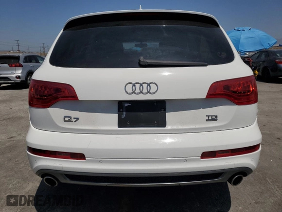 2010 Audi Q7 Prestige with VIN WA1WMAFE9AD005130, listed as a Copart auction lot 63524715 with 127,823 mi miles and Salvage title. Bid and sale history available at DreamBid. Image 6.