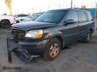 2005 Honda Pilot EX-L with NAVI with VIN 2HKYF187X5H514571, listed as a IAAI auction lot 41746538 with 276,994 mi miles. Bid and sale history available at carsss.com. Image 19.