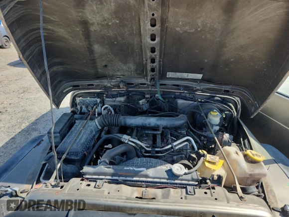 2003 Jeep Wrangler Rubicon with VIN 1J4FA69S13P310131, listed as a Copart auction lot 59139025 with 260,349 mi miles and Salvage title. Bid and sale history available at DreamBid. Image 11.