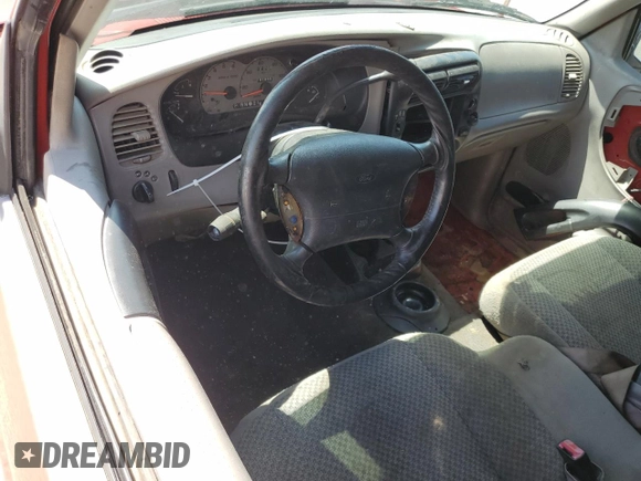 1999 Ford Ranger XL z VIN 1FTZR15V3XPC09094, wystawiony jako Copart lot #56475015 z przebiegiem 167 065 mil mil oraz Szkoda całkowita • Salvage title. Historia ofert i sprzedaży dostępna na DreamBid. Obrazek 8.