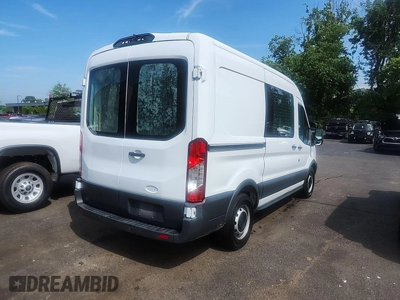 2018 Ford Transit z VIN 1FTYE1CM3JKB42289, wystawiony jako IAAI lot #42717396 z przebiegiem 88 406 mil mil oraz . Historia ofert i sprzedaży dostępna na DreamBid. Obrazek 9.