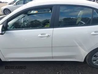 2023 Kia Rio LX z VIN 3KPA24AD6PE539134, wystawiony jako IAAI lot #41519326 z przebiegiem 39 925 mil mil oraz . Historia ofert i sprzedaży dostępna na DreamBid. Obrazek 14.