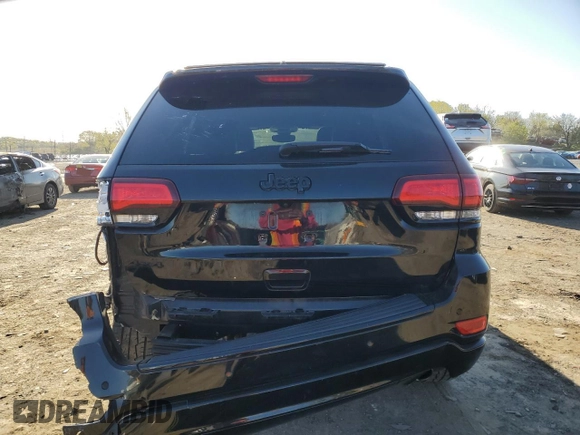 2018 Jeep Grand Cherokee Altitude with VIN 1C4RJFAGXJC296051, listed as a Copart auction lot 53450135 with 65,838 mi miles and Salvage title. Bid and sale history available at DreamBid. Image 6.