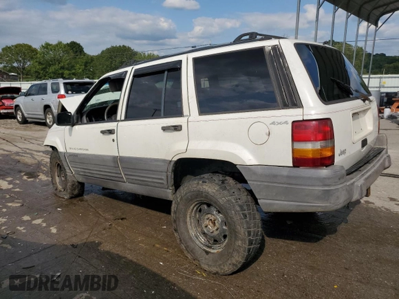 1996 Jeep Grand Cherokee Laredo with VIN 1J4GZ58S9TC277492, listed as a Copart auction lot 66732404 with Not provided miles and Salvage title. Bid and sale history available at DreamBid. Image 2.