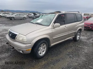 2001 Suzuki XL7 Standard z VIN JS3TX92VX14114699, wystawiony jako IAAI lot #41085552 z przebiegiem 195 316 mil mil oraz . Historia ofert i sprzedaży dostępna na DreamBid. Obrazek 2.