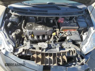 2009 Toyota Yaris z VIN JTDBT903891317448, wystawiony jako Copart lot #56153315 z przebiegiem 209 441 mil mil oraz Szkoda całkowita • Salvage title. Historia ofert i sprzedaży dostępna na DreamBid. Obrazek 11.