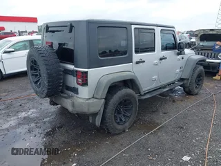 2007 Jeep Wrangler Unlimited X with VIN 1J4GA39187L209448, listed as a IAAI auction lot 42104328 with 138,302 mi miles and . Bid and sale history available at DreamBid. Image 4.