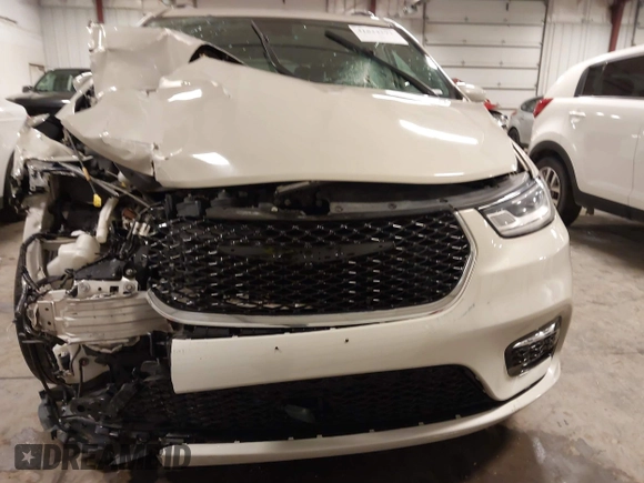 2021 Chrysler Pacifica Touring L with VIN 2C4RC1BG7MR531772, listed as a IAAI auction lot 41834392 with 156,123 mi miles and . Bid and sale history available at DreamBid. Image 12.