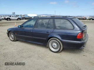 2000 BMW 5 Series 528iAt with VIN WBADP634XYBV64797, listed as a Copart auction lot 71316904 with 163,267 mi miles and Salvage Title. Bid and sale history available at carsss.com. Image 2.