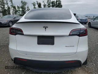 2022 Tesla Model Y Performance with VIN 7SAYGDEFXNF396758, listed as a Copart auction lot 59006365 with 47,882 mi miles and Salvage title. Bid and sale history available at DreamBid. Image 6.