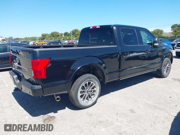 2018 Ford F-150 XL with VIN 1FTFW1EG9JFC63669, listed as a IAAI auction lot 41748012 with 143,584 mi miles. Bid and sale history available at carsss.com. Image 4.