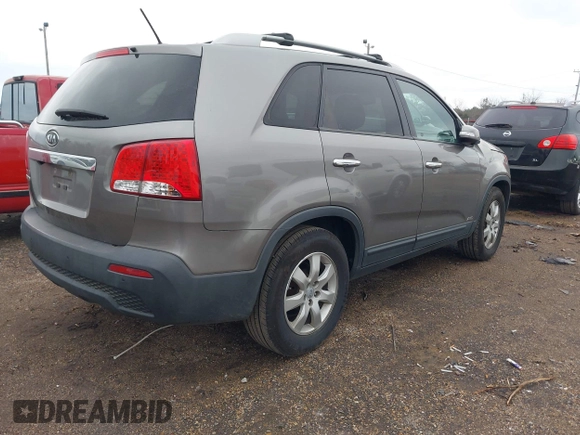 2012 Kia Sorento LX with VIN 5XYKTDA21CG244973, listed as a IAAI auction lot 41268549 with 211,858 mi miles. Bid and sale history available at carsss.com. Image 4.