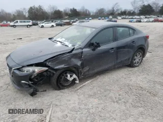 2014 Mazda 3 i SV with VIN JM1BM1T76E1169811, listed as a Copart auction lot 89407985 with 62,719 mi miles and Salvage Title. Bid and sale history available at DreamBid. Image 1.