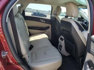 2019 Ford Edge Titanium z VIN 2FMPK3K91KBB99949, wystawiony jako Copart lot #57023225 z przebiegiem 103 876 mil mil oraz Nie do naprawy. Historia ofert i sprzedaży dostępna na DreamBid. Obrazek 11.