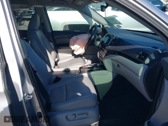 2020 Honda Pilot Touring 8-Passenger with VIN 5FNYF6H95LB021455, listed as a IAAI auction lot 41187609 with 35,589 mi miles and . Bid and sale history available at DreamBid. Image 5.
