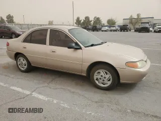 1999 Ford Escort LX z VIN 1FAFP10P2XW132084, wystawiony jako Copart lot #53642945 z przebiegiem 142 227 mil mil oraz Szkody całkowita. Historia ofert i sprzedaży dostępna na DreamBid. Obrazek 4.