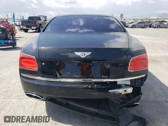 2014 Bentley Flying Spur z VIN SCBEC9ZA2EC095912, wystawiony jako Copart lot #51672955 z przebiegiem 42 555 mil mil oraz Szkoda całkowita • Salvage title. Historia ofert i sprzedaży dostępna na DreamBid. Obrazek 6.