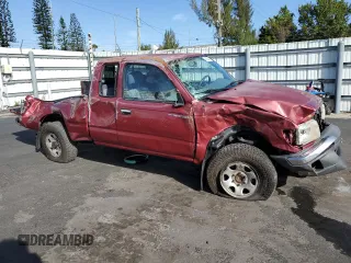 1999 Toyota Tacoma PreRunner with VIN 4TASN92NXXZ573027, listed as a Copart auction lot 48025455 with 111,854 mi miles and Salvage title. Bid and sale history available at DreamBid. Image 4.