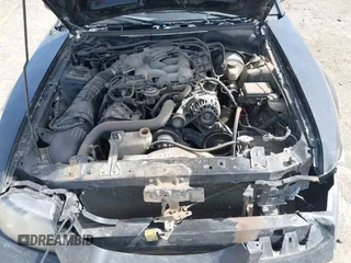 2004 Ford Mustang Standard with VIN 1FAFP40604F156534, listed as a IAAI auction lot 41794486 with 216,207 mi miles. Bid and sale history available at carsss.com. Image 10.