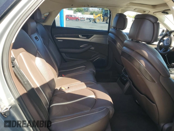 2012 Audi A8 z VIN WAURVAFD7CN023286, wystawiony jako Copart lot #56594745 z przebiegiem 199 443 mil mil oraz Czysty tytuł • Clean title. Historia ofert i sprzedaży dostępna na DreamBid. Obrazek 10.