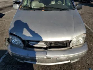2002 Toyota Sienna LE with VIN 4T3ZF13C52U505287, listed as a Copart auction lot 77164884 with 0 mi miles and Salvage Title. Bid and sale history available at carsss.com. Image 13.