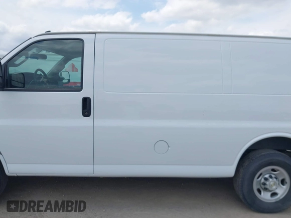 2023 Chevrolet Express Cargo Van with VIN 1GCWGAFP5P1192004, listed as a IAAI auction lot 42060862 with 31,706 mi miles. Bid and sale history available at carsss.com. Image 14.