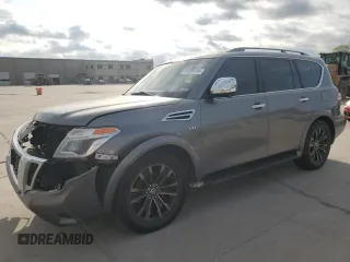 2017 Nissan Armada Platinum z VIN JN8AY2NE2H9700319, wystawiony jako Copart lot #51859735 z przebiegiem Nie podano mil oraz Szkoda całkowita • Salvage title. Historia ofert i sprzedaży dostępna na DreamBid. Obrazek 1.