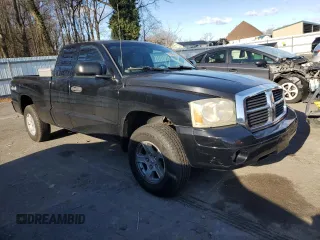 2006 Dodge Dakota SLT with VIN 1D7HW42K46S524262, listed as a Copart auction lot 82985654 with 124,170 mi miles and Salvage Title. Bid and sale history available at DreamBid. Image 4.