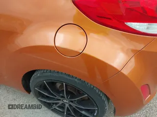 2013 Hyundai Veloster RE:MIX with VIN KMHTC6AD5DU106088, listed as a IAAI auction lot 41904678 with 213,478 mi miles and . Bid and sale history available at DreamBid. Image 6.