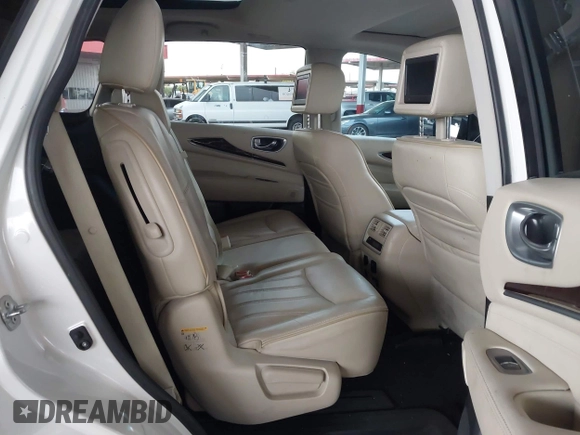2015 Infiniti QX60 with VIN 5N1AL0MM6FC553098, listed as a IAAI auction lot 42024025 with 70,080 mi miles and . Bid and sale history available at DreamBid. Image 8.