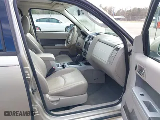 2010 Mercury Mariner Premier with VIN 4M2CN8HG4AKJ05736, listed as a IAAI auction lot 41744987 with 209,819 mi miles. Bid and sale history available at carsss.com. Image 5.